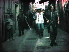 Photo: Two Palestinians being arrested in the Old City