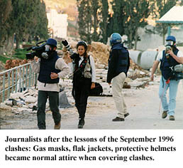 Photo: Journalists in 'battle gear' after the lessons of the September 1996 clashes