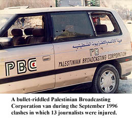 Photo: Palestinian Broadasting Corporation van riddled with bullet holes during September 1996 clashes