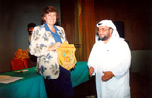 Photo:  Director of CED recieving a certificate of recognition for programs offered