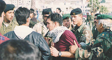 Photo: Scuffle with Palestinian police