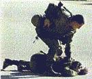 Photo: Friedman being subdued by an Israeli soldier