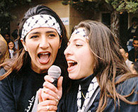 Singing, with gusto