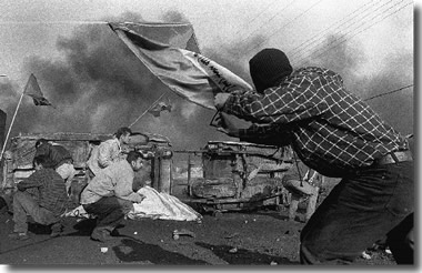 Taking Cover from Israeli fire.