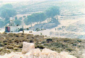 Photo: Building under construction bristling with Israeli guns