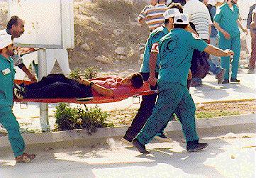 Photo: Kid on stretcher, close up